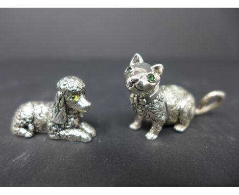 Two sterling silver animals, to include a cat, H.2.3 W.4.5cm, and a poodle, H.1.8 W.3cm 