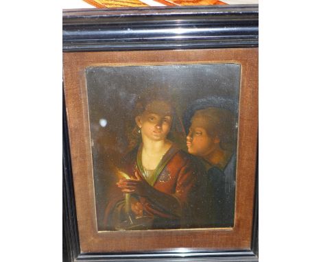 A 19th century study of a man and woman by candle light, oil on metal panel, in ebonized frame, 20 x 16cm 