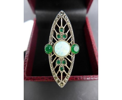 An Art Deco style white metal ring with opalite panel and emerald surround, size Q 