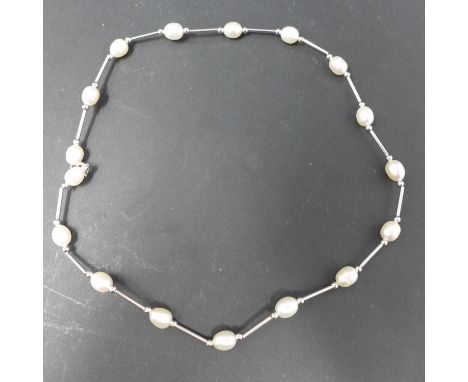 A cultured pearl necklace with silver spacers and clasp 
