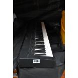 A Pre-owned Yamaha P45 B Digital Piano with Some Accessories and a Travel Bag. Item is Untested, Vie