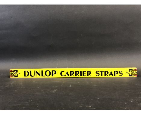 A Dunlop Carrier Straps shelf strip in good condition.