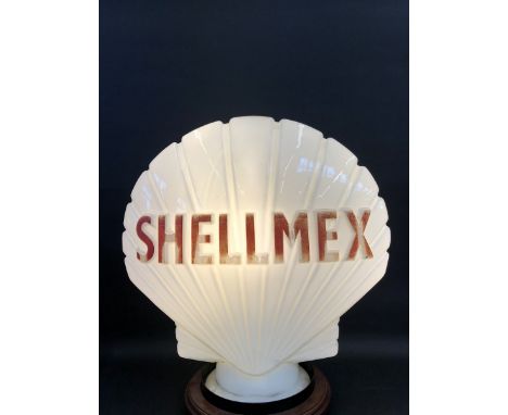 A Shellmex glass petrol pump globe by Hailware, faded lettering and minor nicks to neck.