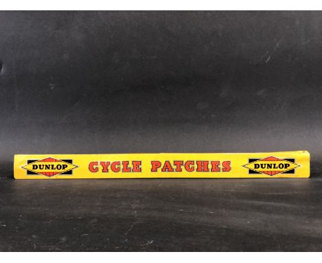 A Dunlop Cycle Patches shelf strip.