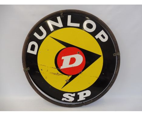 A Dunlop SP circular double sided enamel sign in a tubular metal frame, 30" diameter overall. 