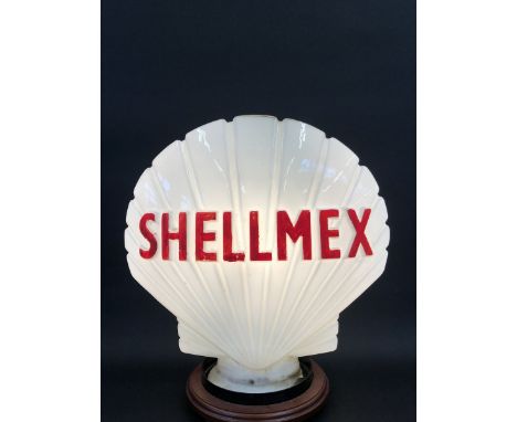 A Shellmex glass petrol pump globe by Hailware, chips to the neck and letters repainted badly.