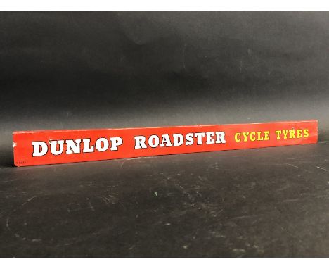 A Dunlop Roadster Cycle Tyres shelf strip.