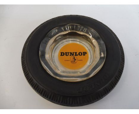 A Dunlop tyre with advertising Dunlop glass insert.