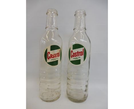 Two Castrol glass oil bottles.