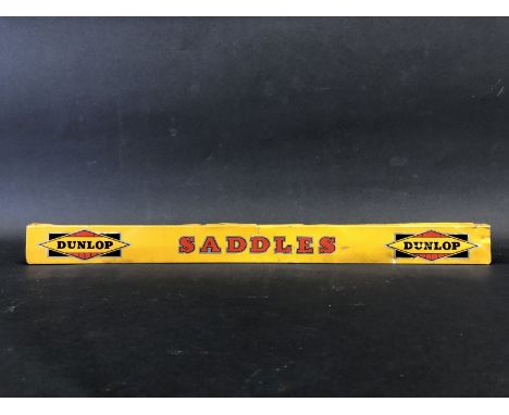 A Dunlop Saddles shelf strip.