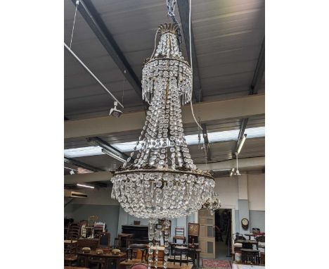 A large three light cut glass chandelier of tent and bag form with gilt metal frame, approx 130cm