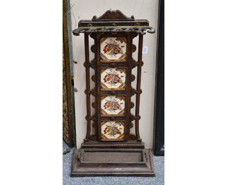 A late 19th century cast iron and tile umbrella stand, with Halls patent mechanism, 86cm high Halls mechanism operational, se