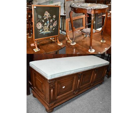 A 20th century mahogany occasional table on hoof feet, together with an oak framed needlework firescreen and a modern oak car