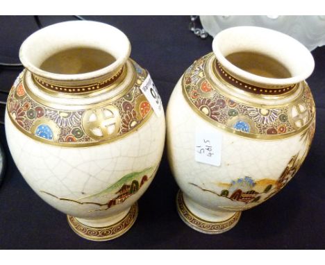 HANDPAINTED VASES. Pair of handpainted and gilded ceramic vases, decorated with Oriental warrior, H: 19 cm 