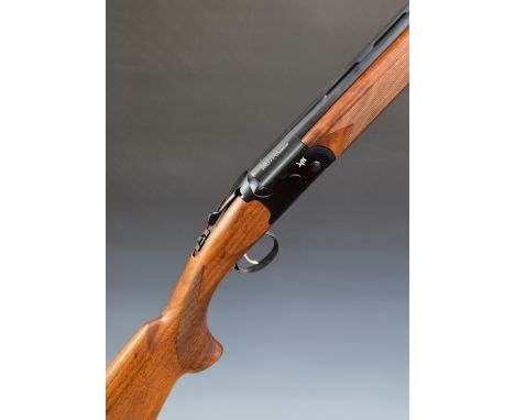 Kofs Sceptre 20 bore over and under ejector shotgun with chequered semi-pistol grip and forend, single trigger, vented top an