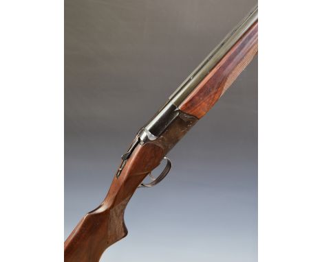 Baikal 12 bore over and under ejector shotgun with engraved scenes of birds to the locks, engraved top lever, trigger guard a