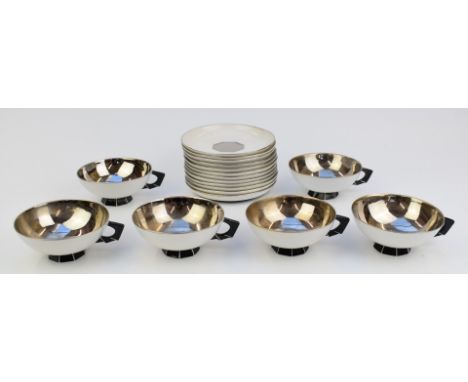 Fifteen pieces of Sèvres Art Deco style cups and saucers with silvered interior