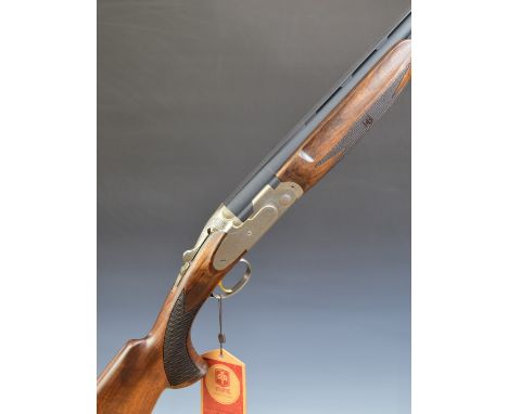 ATA SP Elegant Sporter 12 bore over and under ejector shotgun with engraved locks, sidelock plates, underside, trigger guard,