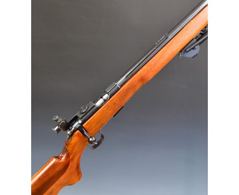BRNO Model 4 .22 bolt-action target rifle with semi-pistol grip, bipod, multi-shot magazine, sling mounts, fully adjustable t