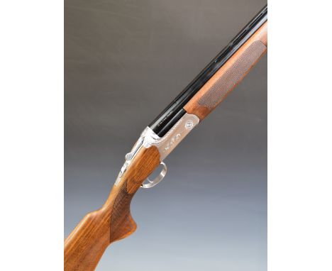 Reximex RMX-1 12 bore over and under ejector shotgun with engraved locks, underside, trigger guard and thumb lever, chequered