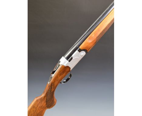 Beretta S685E 12 bore over and under ejector shotgun with engraved lock, underside, trigger guard, top plate and thumb lever,