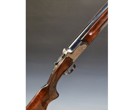 AYA 12 bore over and under ejector shotgun with engraved locks, top plate, trigger guard and underside, single trigger, chequ