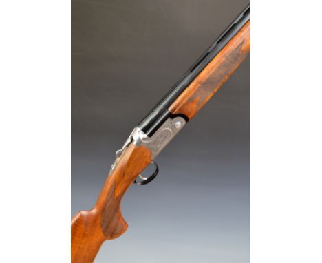 Kofs Zenith 12 bore over and under ejector shotgun with engraved locks and underside, chequered semi-pistol grip and forend, 