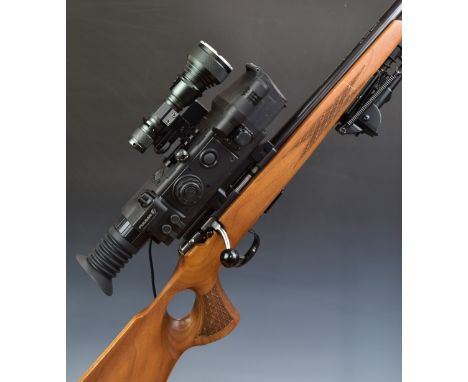 Anschutz Model 1517 .17 bolt-action rifle with chequered semi-pistol grip and forend, raised cheek piece, bi-pod, sling mount