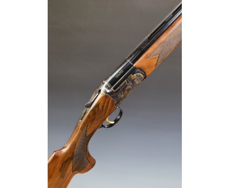 Bettinsoli X-Trail 12 bore over and under ejector shotgun with engraved scenes of birds to the locks, underside and thumb lev