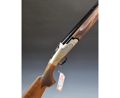 Kral Arms ST500 12 bore over and under ejector shotgun with engraved locks, chequered semi-pistol grip and forend, single tri