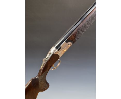 Beretta 682 Gold E Sporting 12 bore over and under ejector shotgun with with chequered semi-pistol grip and forend, vented to