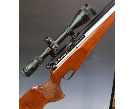 Daystate Harrier X .22 PCP FAC air rifle with textured semi-pistol grip, raised cheek piece, sound moderator and Simmons 6.5-