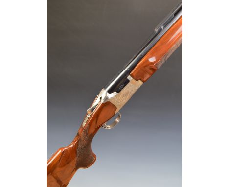 Winchester Diamond Grade Trap 12 bore over and under shotgun with engraved lock, underside, trigger guard and thumb lever, ch