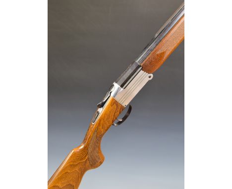 Investarm 20 bore 3" magnum folding over and under shotgun with chequered semi-pistol grip and forend, single trigger, vented