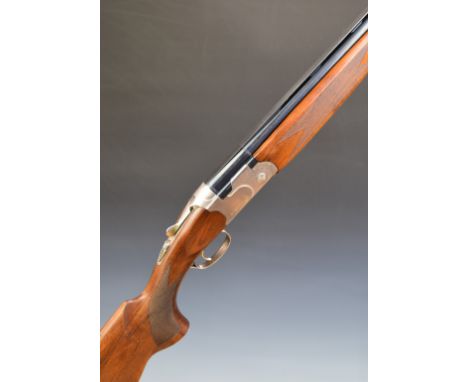 Beretta 686 Onyx 12 bore over and under ejector shotgun with named lock and underside, chequered semi-pistol grip and forend,