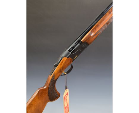 ATA SP 20 bore over and under ejector shotgun with chequered semi-pistol grip and forend, single trigger, vented top rib and 