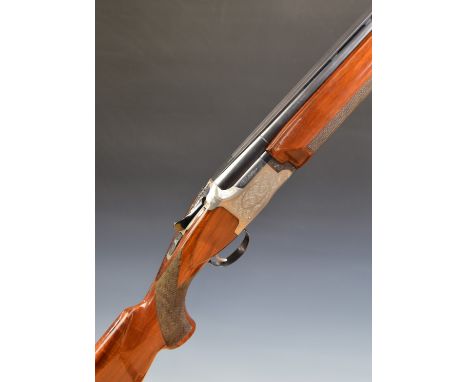 Winchester 101 XTR Sporter 12 bore over and under ejector shotgun with engraved locks, underside, trigger guard and thumb lev