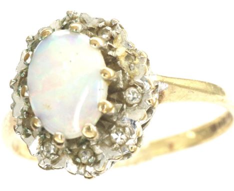 9ct gold opal and diamond ring, size O, 1.8g. P&amp;P Group 1 (£14+VAT for the first lot and £1+VAT for subsequent lots) 