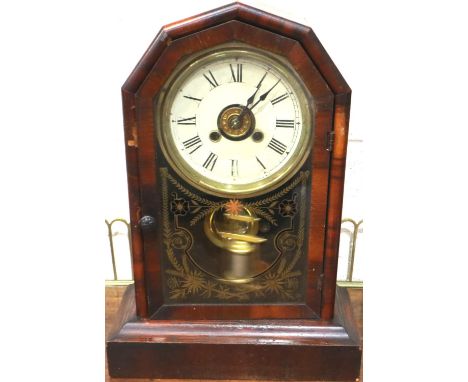 Mahogany cased American made mantel clock with glass panel, key and pendulum, H: 35 cm, working at lotting. P&amp;P Group 3 (