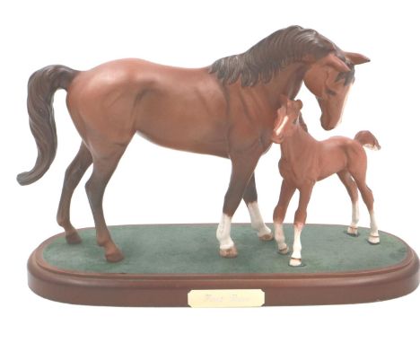 Royal Doulton First Born figural group on a wooden base, H: 18 cm, no crack or chips. P&amp;P Group 2 (£18+VAT for the first 