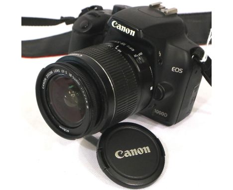 Canon 1000D camera with a EFS 18 to 55mm lens with battery and SD card, working at time of lotting. P&amp;P Group 1 (£14+VAT 