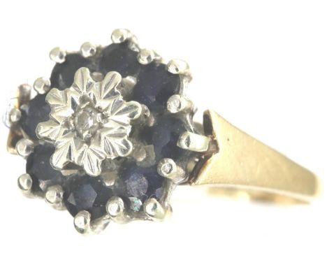 9ct gold cluster ring set with a single diamond and sapphires, size P, 2.0g. P&amp;P Group 1 (£14+VAT for the first lot and £