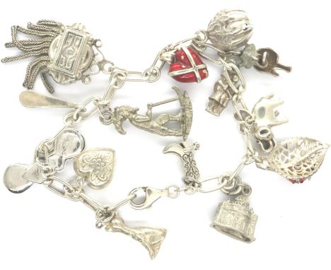 925 silver bracelet with fourteen charms, L: 18 cm. P&amp;P Group 1 (£14+VAT for the first lot and £1+VAT for subsequent lots