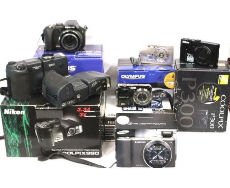 Collection of mixed digital cameras to include Olympus, Nikon, Fuji and others. P&amp;P Group 3 (£25+VAT for the first lot an