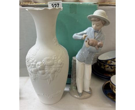 A boxed Kaiser porcelain vase &amp; a Nao figure boy with puppy