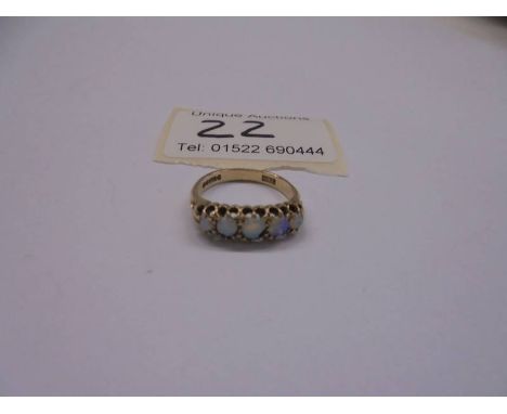A five stone vintage opal ring set in 9ct gold, size L half, 2.79 grams