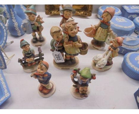 Eight Goebel figurines.