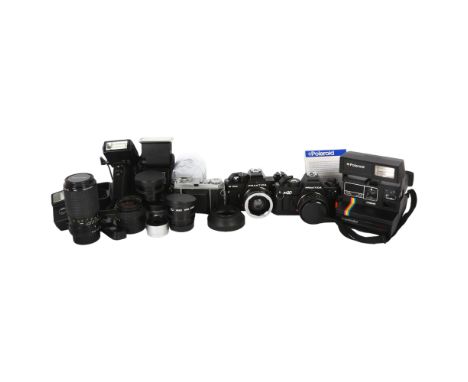 A quantity of Vintage cameras and equipment, including a Kodak Retina IA, a Polaroid Supercolour 635CL, a Praktica BX20, a Pr