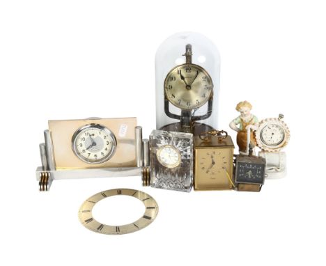 A brass 400-day clock under glass dome, H28cm, an Art Deco mantel clock, porcelain pocket watch stand and watch etc 