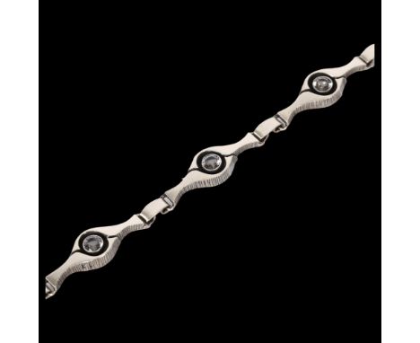 KARL LAINE, FINNISH - an eye design sterling silver and cubic zirconia set panel bracelet 